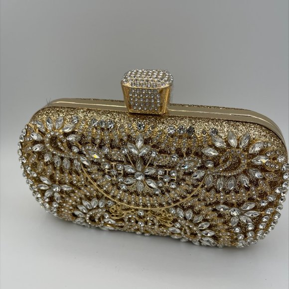 Handbags - Golden metal work and Cz clear stones on clamshell clutch or cross body bag.